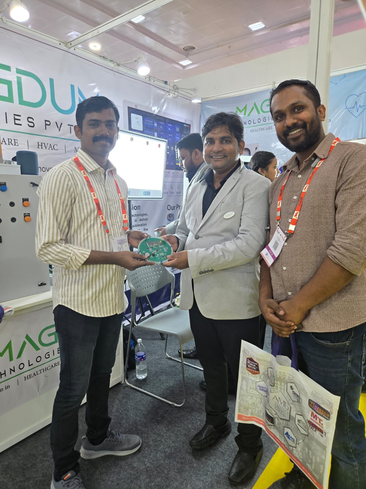 Presenting a Magdum memento at the expo